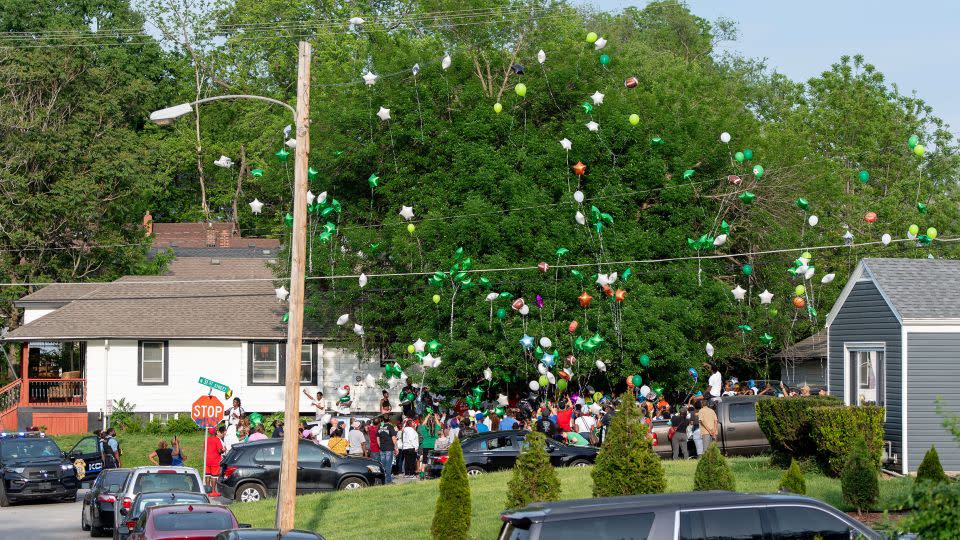 People release balloons during a vigil for Sir'Antonio on May 10 in Kansas City, Kansas. - Nick Wagner/The Kansas City Star/TNS/Zuma