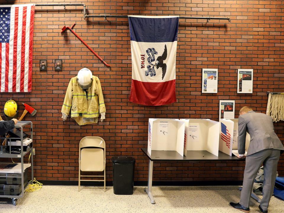 Voters cast ballots at the West Des Moines Fire Station 18 in West Des Moines, Iowa.