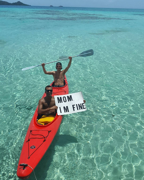 Kayaking in the Caribbean off the coast of Providencia Island in Colombia. 