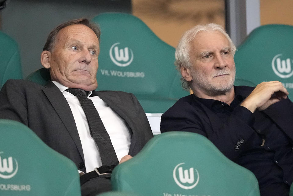 German football federation Vice President Hans-Joachim Watzke , left, and Sporting Director Rudi Voeller reacts on the tribune prior an international friendly soccer match between Germany and Japan in Wolfsburg, Germany, Saturday, Sept. 9, 2023. (AP Photo/Martin Meissner)