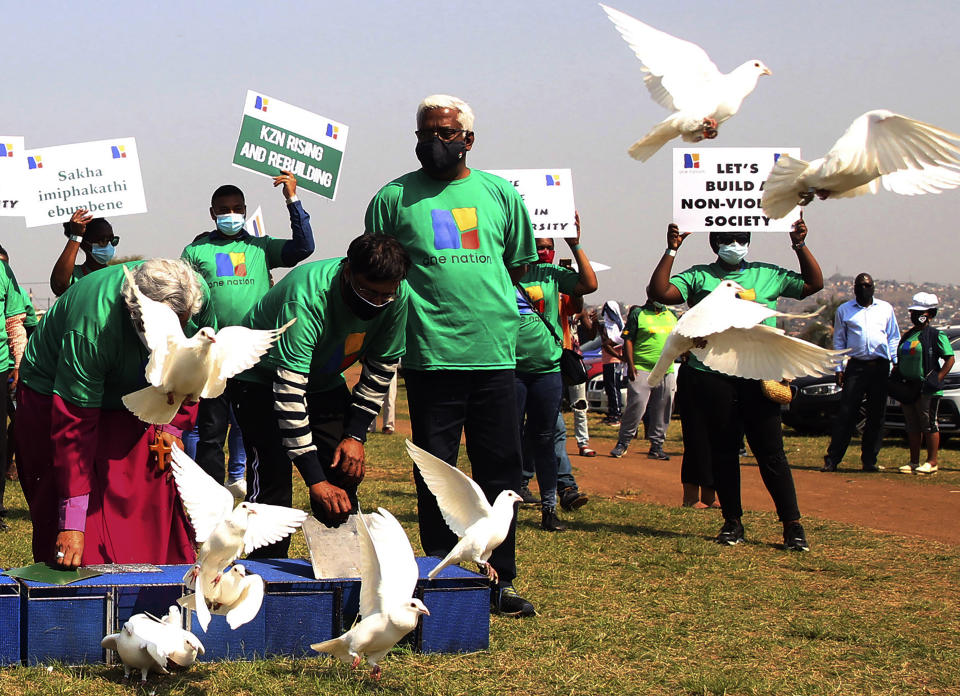 White doves are set free at a peace march held in Phoenix, near Durban, South Africa, Tuesday, Sept. 14, 2021 the scene of recent racial tensions and unrest over the jailing of former President Jacob Zuma. The upcoming local elections, set for Nov. 1, 2021, come at a difficult time for the ruling African National Congress which has been struggling with internal divisions. (AP Photo)