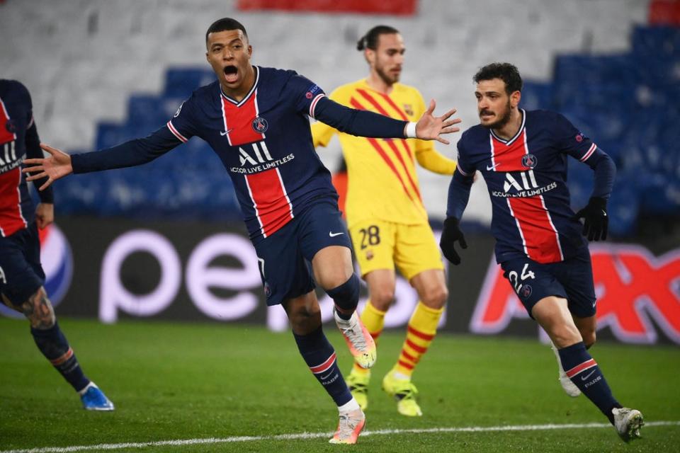 Kylian Mbappe celebrates after scoring during the UEFA Champions League round of 16 second leg football match between Paris Saint-Germain and FC Barcelona (AFP via Getty Images)