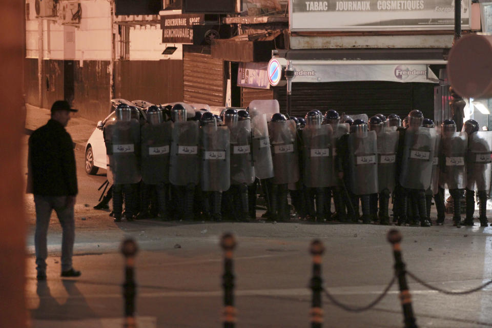 Riot police officers gather in Algiers after the presidential elections, Thursday Dec.12, 2019. Algerians — without a leader since April — voted for a new president or boycotted and held street protests against the elections decried by a massive pro-democracy movement that forced former leader Abdelaziz Bouteflika to resign. (AP Photo/Fateh Guidoum)