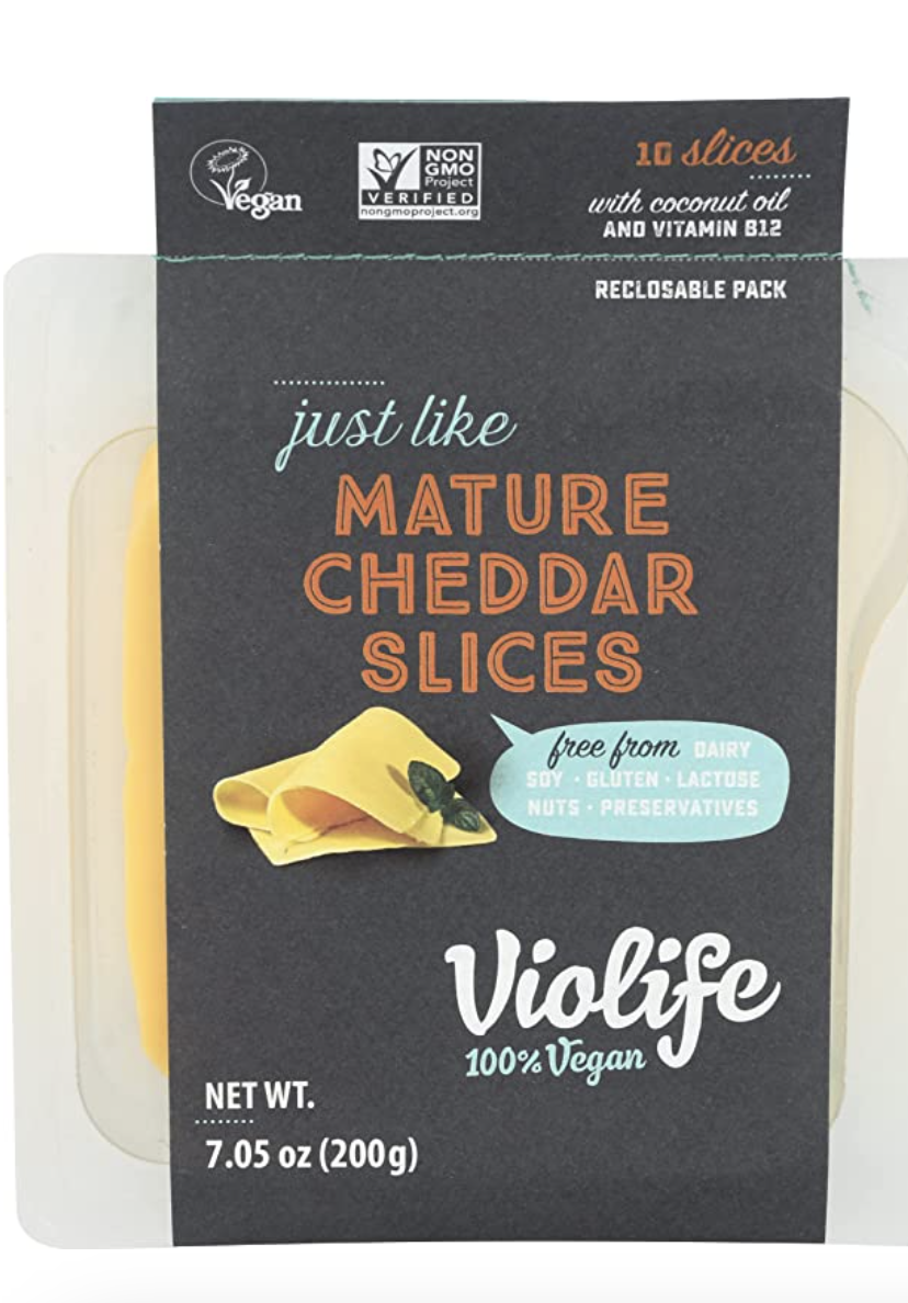 <p><a href="https://us.amazon.com/Violife-Cheddar-Mature-Slices-Ounce/dp/B07FYWPVD4/ref=sr_1_1_f3_0g_fs?crid=3UWMJFZUH9VKE&keywords=Just+Like+Mature+Cheddar+Slices&qid=1682787037&s=grocery&sprefix=just+like+mature+cheddar+slices%2Cgrocery%2C91&sr=1-1&tag=syn-yahoo-20&ascsubtag=%5Bartid%7C2140.g.29648044%5Bsrc%7Cyahoo-us" rel="nofollow noopener" target="_blank" data-ylk="slk:Shop Now;elm:context_link;itc:0;sec:content-canvas" class="link ">Shop Now</a></p><p>Just Like Mature Cheddar Slices</p><p>amazon.com</p><span class="copyright">VioLife</span>