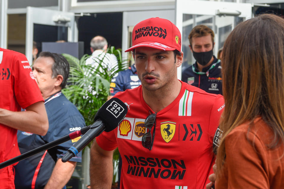 AUSTIN, TX - OCTOBER 24:Scuderia Ferrari Mission Winnow driver Carlos Sainz (55) of Team Spain is interviewed near the garage area before the Aramco U.S. Grand Prix at Circuit of the Americas on October 24, 2021 in Austin, TX. (Photo by Ken Murray/Icon Sportswire via Getty Images)