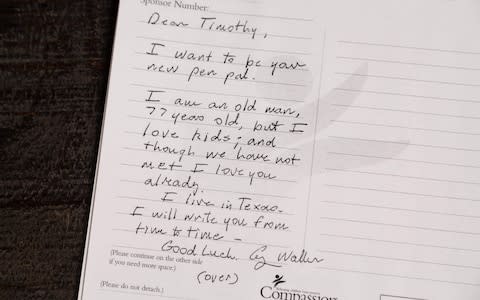 A letter from former US President George HW Bush to his pen pal Timothy, then 7-years-old - Credit: AFP
