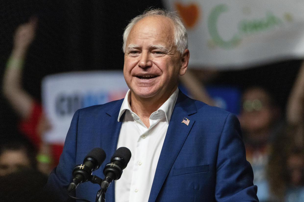 Minnesota Gov. Tim Walz speaks at a campaign rally in Nebraska.