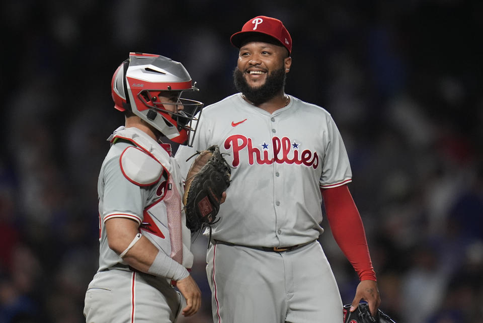 Philadelphia Phillies catcher Rafael Marchán, left, and pitcher José Alvarado celebrate their 5-3 win over the Chicago Cubs in a baseball game Wednesday, July 3, 2024, in Chicago. (AP Photo/Erin Hooley)