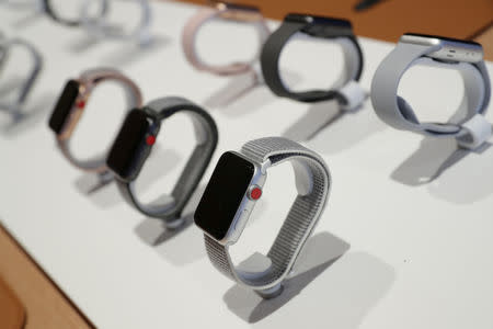 FILE PHOTO: Apple watches are seen at a new Apple store in Chicago, Illinois, U.S., October 19, 2017. REUTERS/John Gress/File Photo