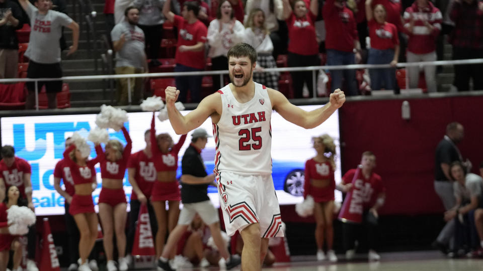 Utah guard Rollie Worster (25) reacts after his team scored against Arizona during the second half of an NCAA college basketball game Thursday, Dec. 1, 2022, in Salt Lake City. (AP Photo/Rick Bowmer)