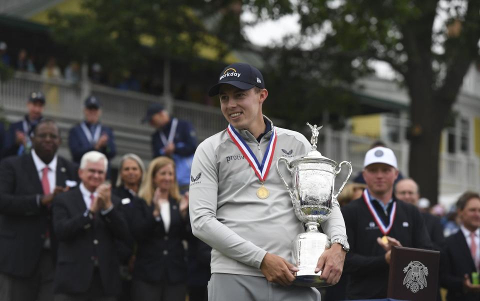 Matt Fitzpatrick of England holds the trophy after winning the 2022 US Open golf tournament at The Country Club in Brookline, Massachusetts, USA, 19 June 2022. 2022 US Open golf tournament - SHUTTERSTOCK 