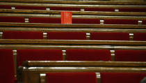 <p>A book of the Spanish constitution is placed on the benches of opposition Catalan lawmakers who left the chamber to boycott a vote on independence inside the Catalan parliament in Barcelona, Spain, Friday, Oct. 27, 2017. (Photo: Manu Fernandez/AP) </p>