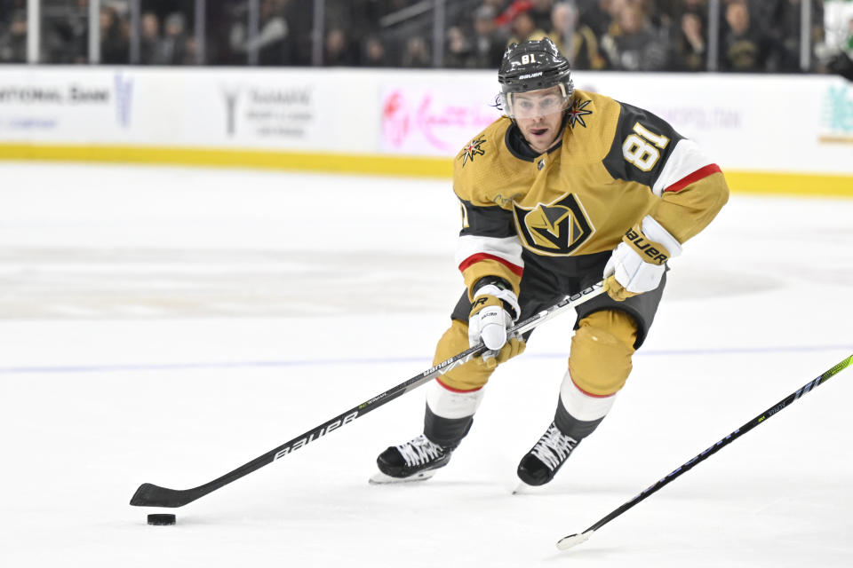 Vegas Golden Knights right wing Jonathan Marchessault skates with the puck against the Dallas Stars during overtime of an NHL hockey game Saturday, Feb. 25, 2023, in Las Vegas. (AP Photo/David Becker)