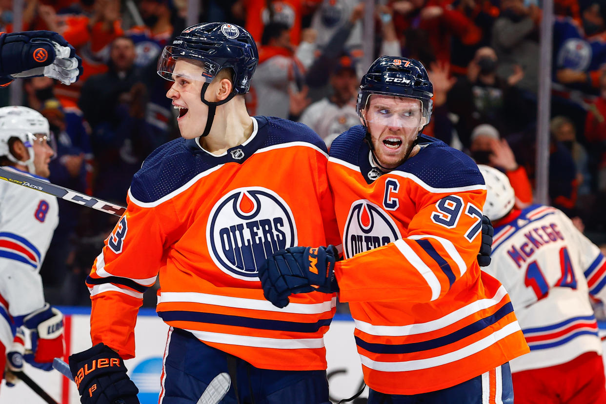 Edmonton Oilers Right Wing Jesse Puljujarvi (13), Edmonton Oilers Center Connor McDavid (97) 