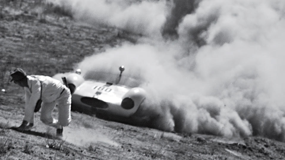 George Grinzewitsch’s Cooper Monaco misses a turn and chases a corner worker up the hill at a sports-car race in California, circa late 1950s or early 1960s. No one was hurt.