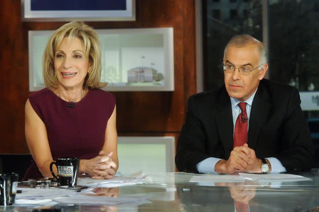 New York Times columnist David Brooks, right, got some blowback from social media users for his tweet about airport food and the U.S. economy.