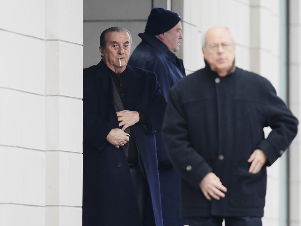 People gather at the funeral home during visitation for Vito Rizzuto in Montreal