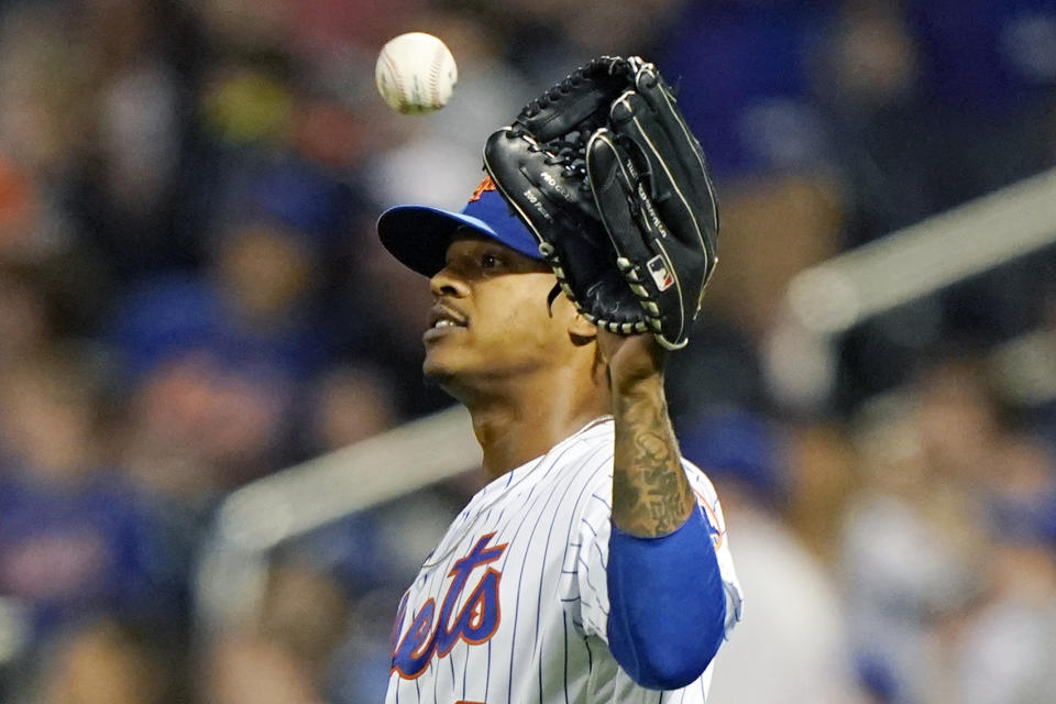 New York Mets starting pitcher Marcus Stroman reacts after nearly allowing a home run to Chicago Cubs' Joc Pederson in the fifth inning of a baseball game, Thursday, June 17, 2021, in New York. (AP Photo/Kathy Willens)