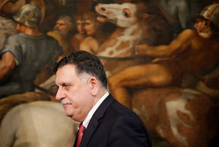 Libyan Prime Minister Fayez al-Sarraj arrives to attend a news conference with his Italian counterpart Paolo Gentiloni (not seen) at Chigi Palace in Rome, Italy, July 26, 2017. REUTERS/Max Rossi