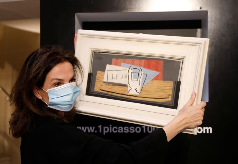 Charity raffle draw designates the winner of a Picasso oil painting for 100 euros at Christie's Paris