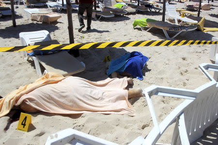 Bodies of tourists shot dead by a gunman lie near a beachside hotel in Sousse, Tunisia June 26, 2015. REUTERS/Amine Ben Aziza