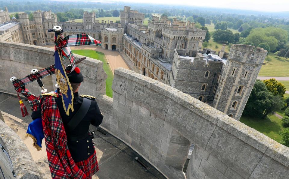 Royal piper plays on top of the Round Tower at Windsor Castle - Steve Parsons 