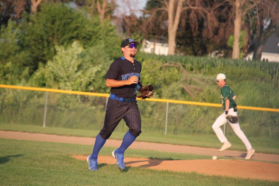 Perry's Gavin Hegstrom heads back to the dugout after making a catch during a game against Saydel on Monday, June 26, 2023.