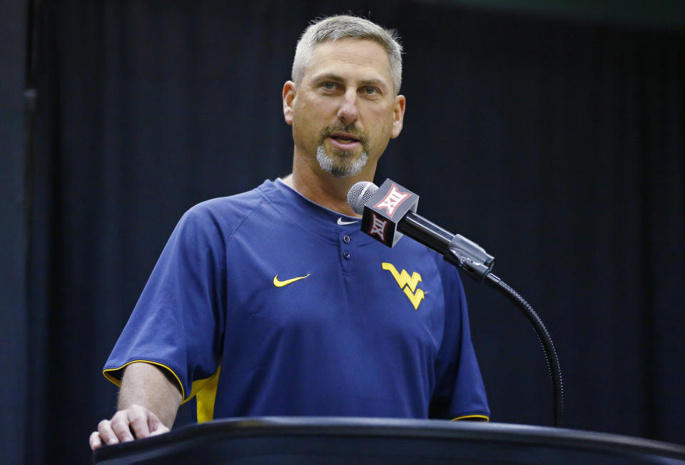 FILE - Randy Mazey, head baseball coach at West Virginia, speaks during a news conference in Tulsa, Okla., Tuesday, May 19, 2015. Mazey, who is retiring at the end of this season, will lead the Mountaineers into the program’s first-ever NCAA super regional. (AP Photo/Sue Ogrocki, file)