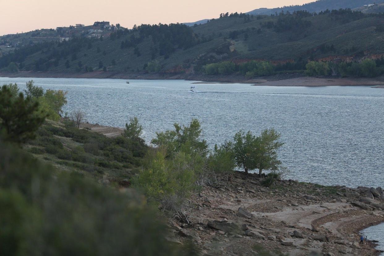 This photo of a Cessna plane flying dangerously close to a boat on Horsetooth Reservoir on Sept. 11, 2022, was used as evidence to charge the pilot with  menacing and reckless endangerment.