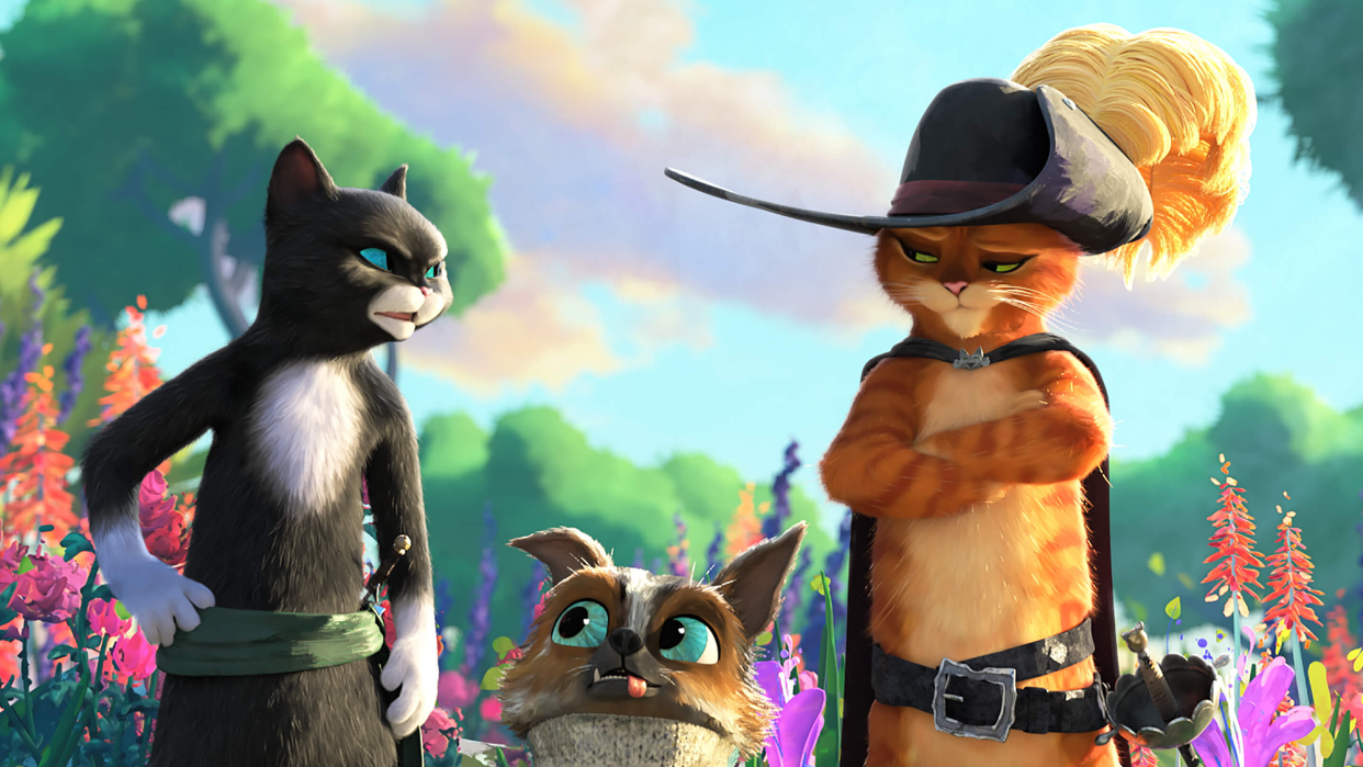  (L to R) Kitty Soft Paws (voiced by Salma Hayek), Perro the dog (Harvey Guillén) and Puss in Boots (voiced by Antonio Banderas) in Puss in Boots: The Last Wish. 