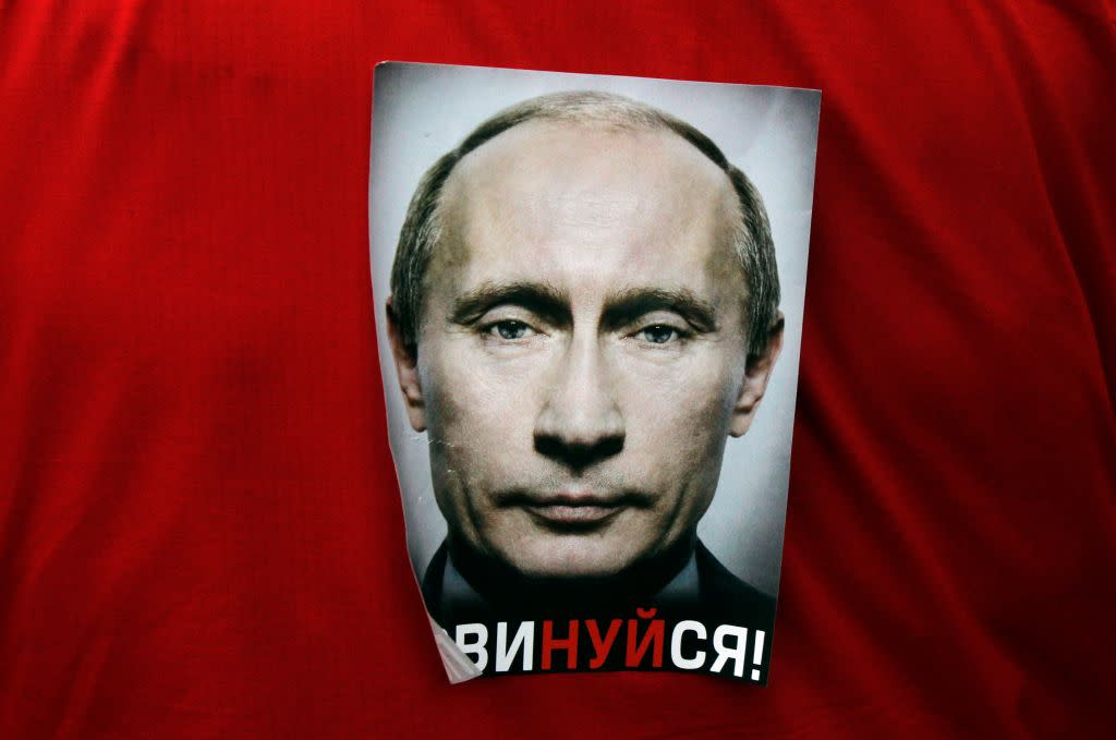 A poster of Putin