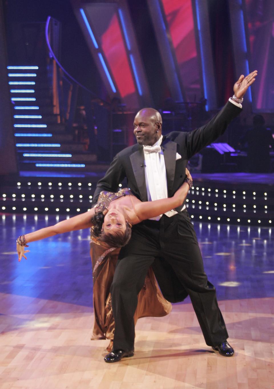 NFL star Emmitt Smith dances with pro Cheryl Burke.