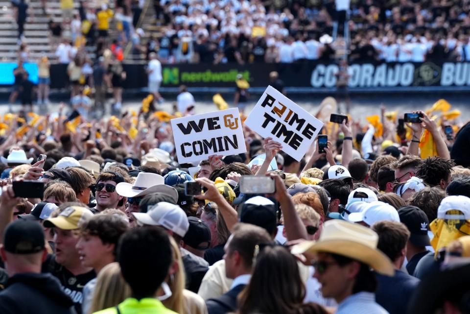 Sep 9, 2023; Boulder, Colorado, USA; Colorado Buffaloes fans celebrate the win over the against the Nebraska Cornhuskers at Folsom Field. Mandatory Credit: Ron Chenoy-USA TODAY Sports