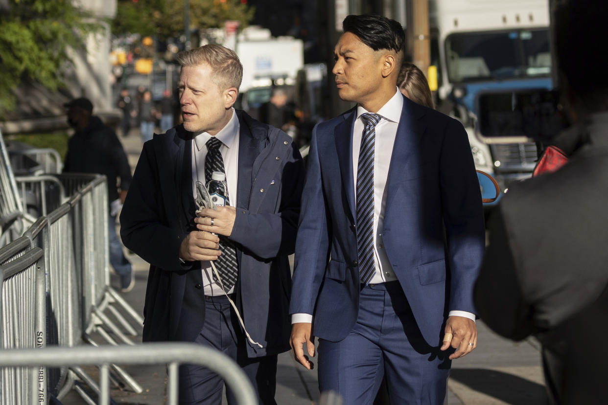 Anthony Rapp, left, arrives at court for the civil lawsuit trial against Kevin Spacey on Oct 6, 2022, in New York.   (Yuki Iwamura / AP)