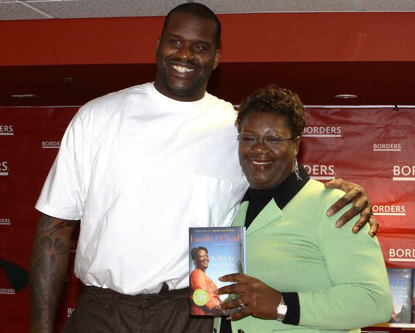 <p>Raymond Boyd/Michael Ochs Archives/Getty</p> Shaquille and Lucille O'Neal poses for photos before signing copies of their book "Walk Like You Have Somewhere To Go" in Chicago, Illinois on April 7, 2010.