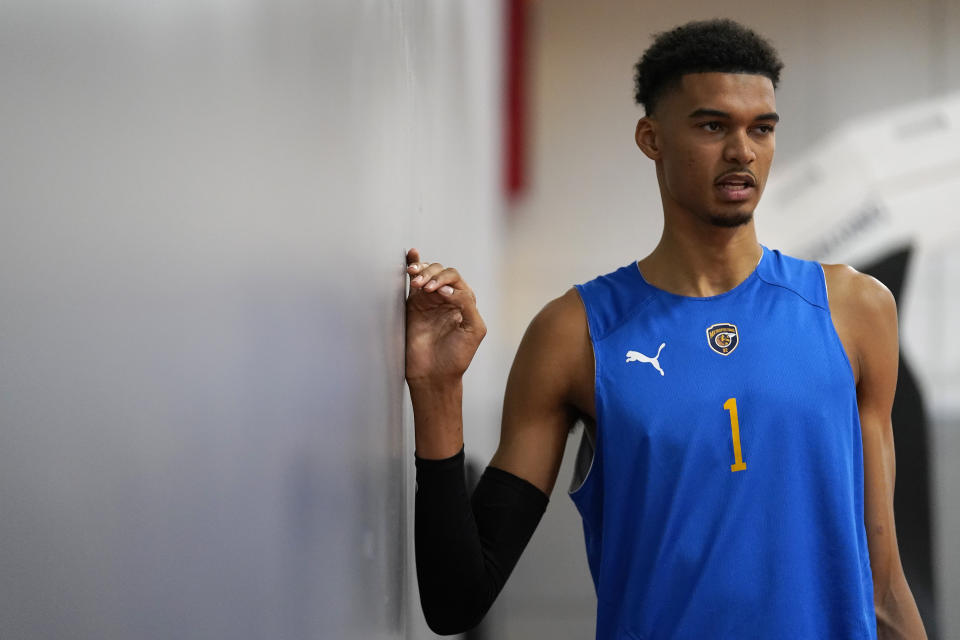 Boulogne-Levallois Metropolitans 92's Victor Wembanyama stretches during a team practice Monday, Oct. 3, 2022, in Las Vegas. (AP Photo/Abbie Parr)