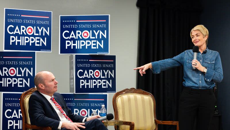 U.S. Senate candidate Carolyn Phippen points at Sen. Mike Lee at a town hall at Kimber Academy in Lindon, Utah, on Friday, April 5, 2024.