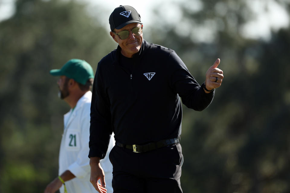 Phil Mickelson, all smiles and thumbs-up on the 2d. (Patrick Smith/Getty Photos)