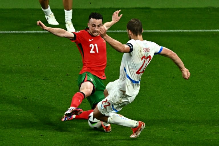 Portugal's forward <a class="link " href="https://sports.yahoo.com/soccer/players/3862749/" data-i13n="sec:content-canvas;subsec:anchor_text;elm:context_link" data-ylk="slk:Diogo Jota;sec:content-canvas;subsec:anchor_text;elm:context_link;itc:0">Diogo Jota</a> (L) had a goal disallowed late on against the Czech Republic (GABRIEL BOUYS)