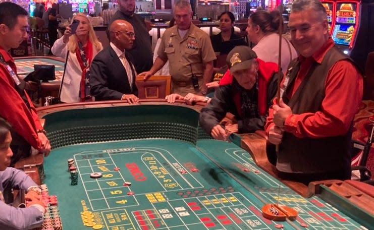 Joe DeMarco, celebrates his 100th birthday shooting craps at Parx Casino in Bensalem, Pa. on Friday Aug. 9, 2024.