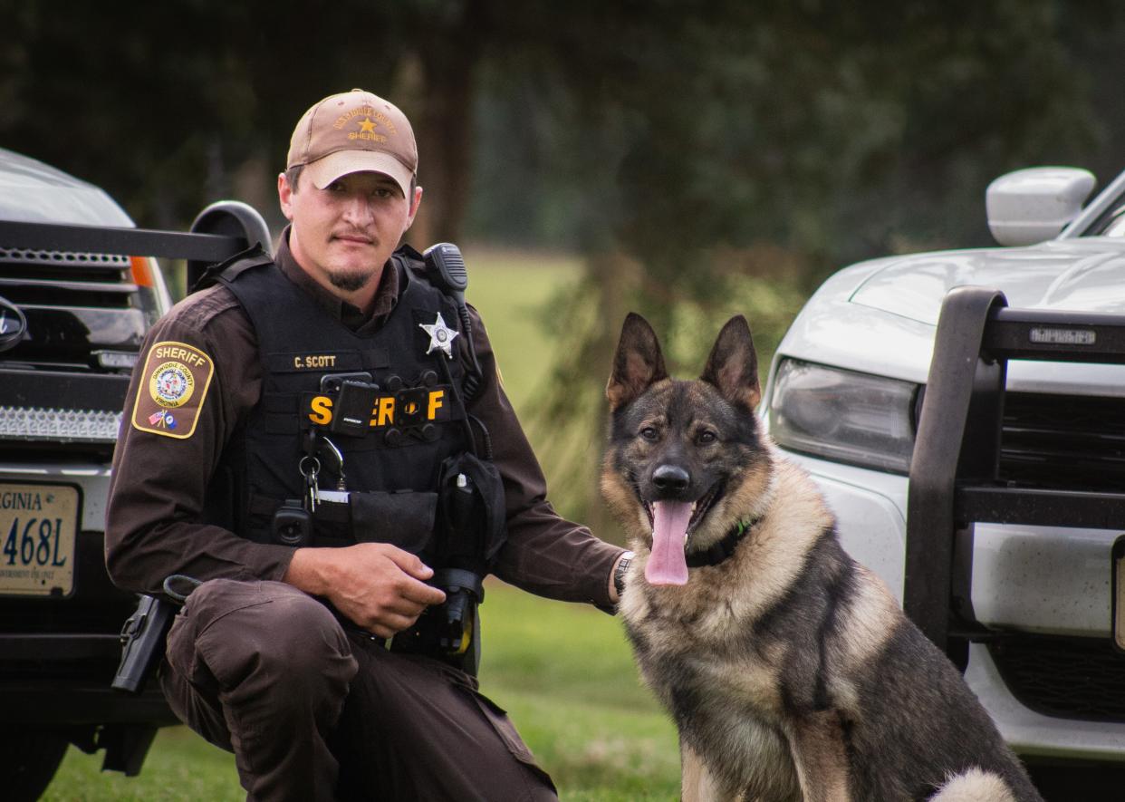 Dinwiddie Deputy Cody Scott, left, and Joker are the newest members of the Sheriff’s Office K9 patrol team. The office said Friday that Joker will be getting protective body armor courtesy of the national nonprofit group Vested Interest in K9s Inc.