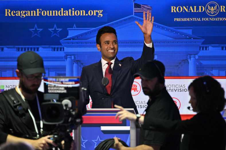 Entrepreneur Vivek Ramaswamy waves at the end of the second Republican presidential primary debate on Sept. 27, 2023, at the Ronald Reagan Presidential Library in Simi Valley, California. (Photo by Robyn Beck/AFP via Getty Images)