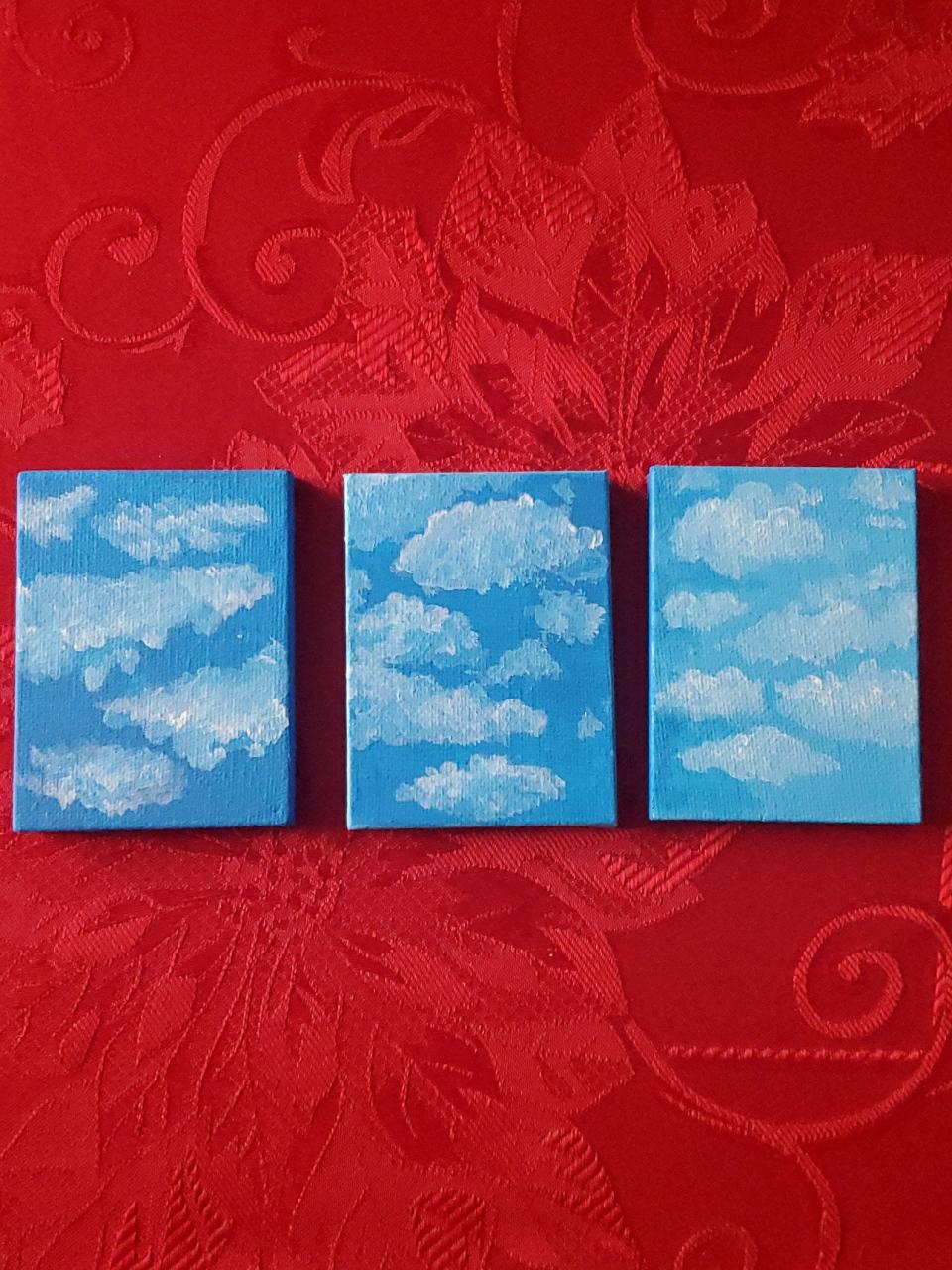 Hand painted blue skies sold on Etsy By Jada Marie Adams, JadaMArt. December 2, 2021