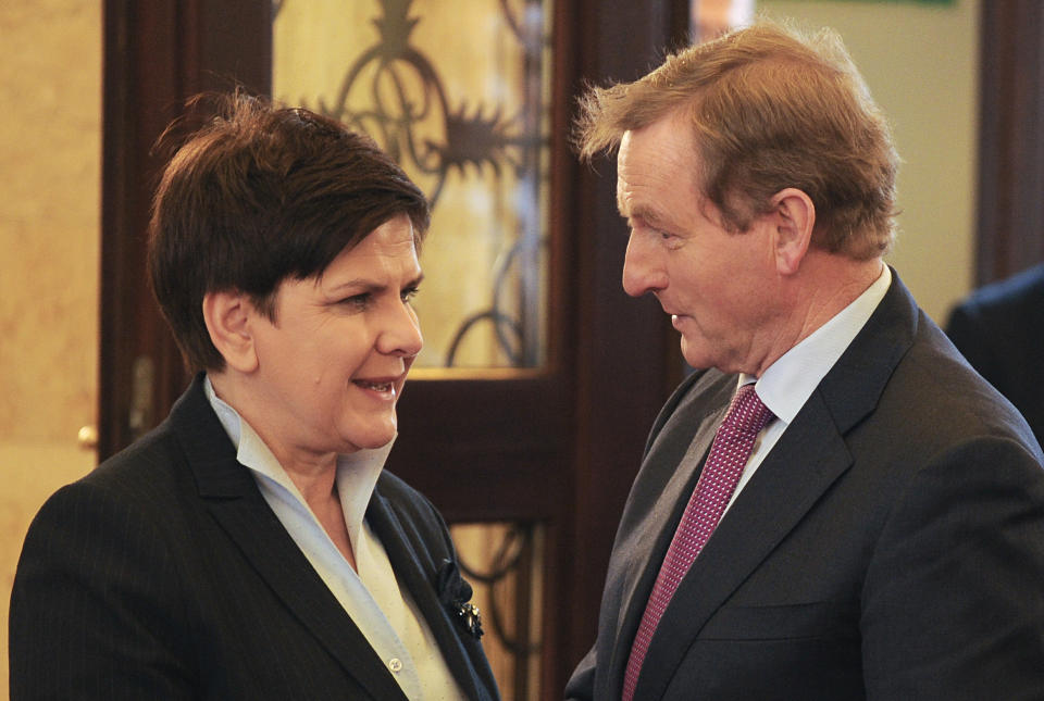 Irish Prime Minister Enda Kenny, right, speaks with his Polish counterpart Beata Szydlo after arrival at the Polish prime minister's chancellery in Warsaw, Poland, Thursday, Feb. 9, 2017. (AP Photo/Alik Keplicz)
