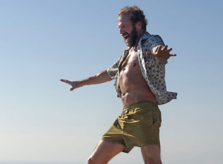 Ralph Fiennes’ dance moves are the real star here. (Photo: Fox Searchlight)