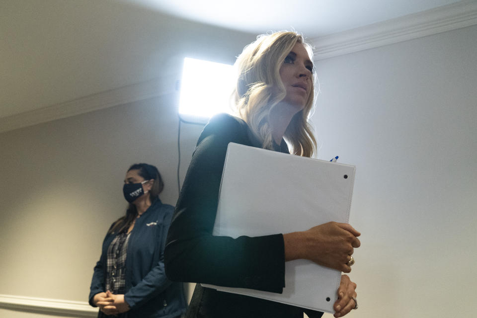 White House press secretary Kayleigh McEnany arrives for a news conference at the Republican National Committee, Monday, Nov. 9, 2020, in Washington. (AP Photo/Alex Brandon)