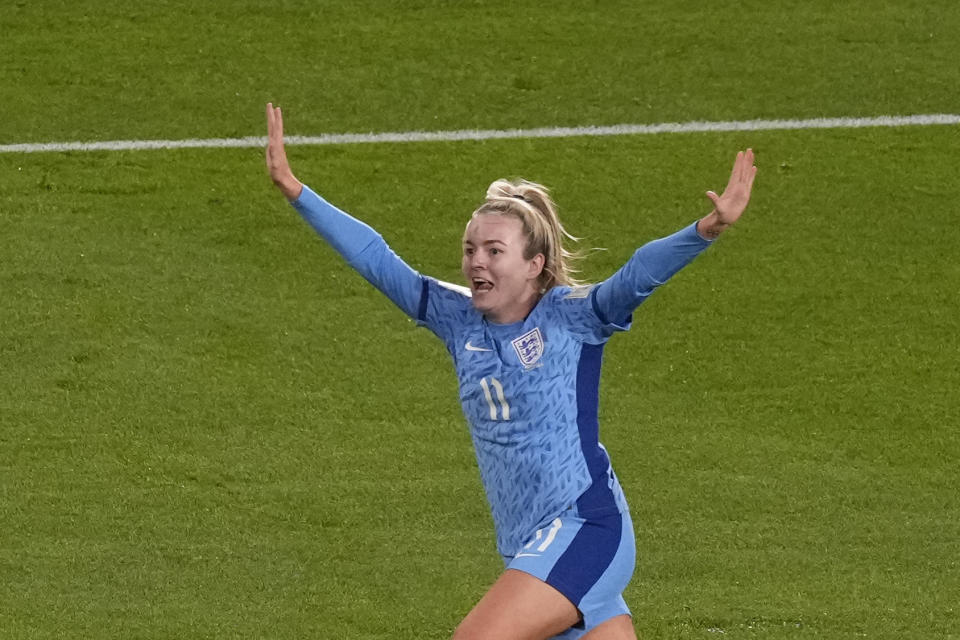 England's Lauren Hemp celebrates after scoring her side's 2nd goal during the Women's World Cup semifinal soccer match between Australia and England at Stadium Australia in Sydney, Australia, Wednesday, Aug. 16, 2023. (AP Photo/Mark Baker)