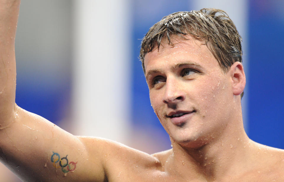 US swimmer Ryan Lochte smiles after he competed in the final of the men's 200-metre freestyle swimming event in the FINA World Championships at the indoor stadium of the Oriental Sports Center in Shanghai on July 26, 2011. He won gold. AFP PHOTO / FRANCOIS XAVIER MARIT (Photo credit should read FRANCOIS XAVIER MARIT/AFP/Getty Images)