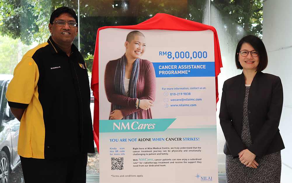 Nilai Medical CEO Jasmine Lau (right) with National Cancer Society Malaysia general manager and medical director Dr Murallitharan Munisamy. — Picture courtesy of Nilai Medical