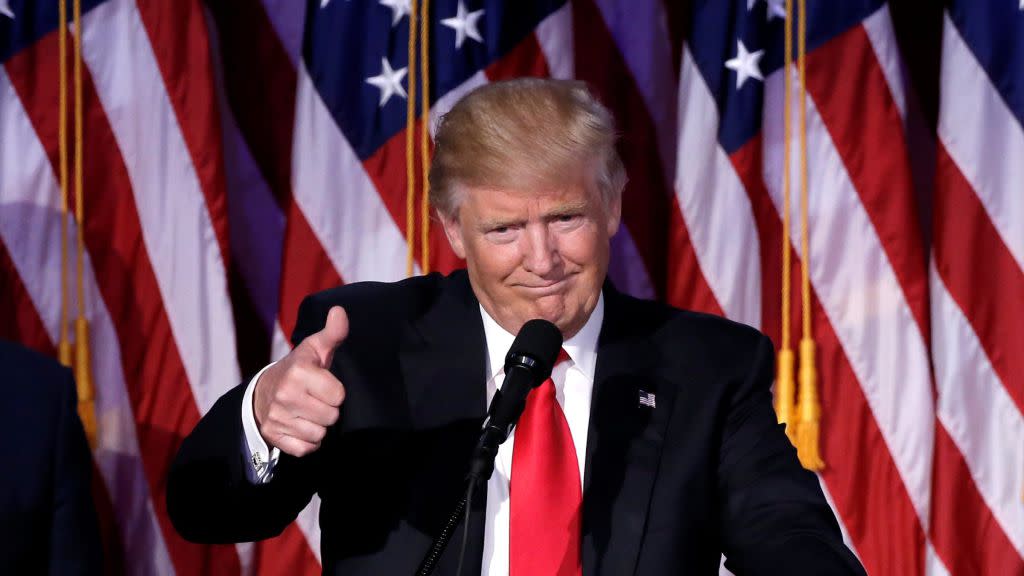 US President-elect Donald Trump gestures as he speaks at election night rally in Manhattan, New York, US